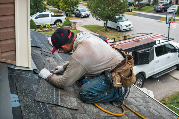 Professional Roof Replacement technician working in Mumford, NY